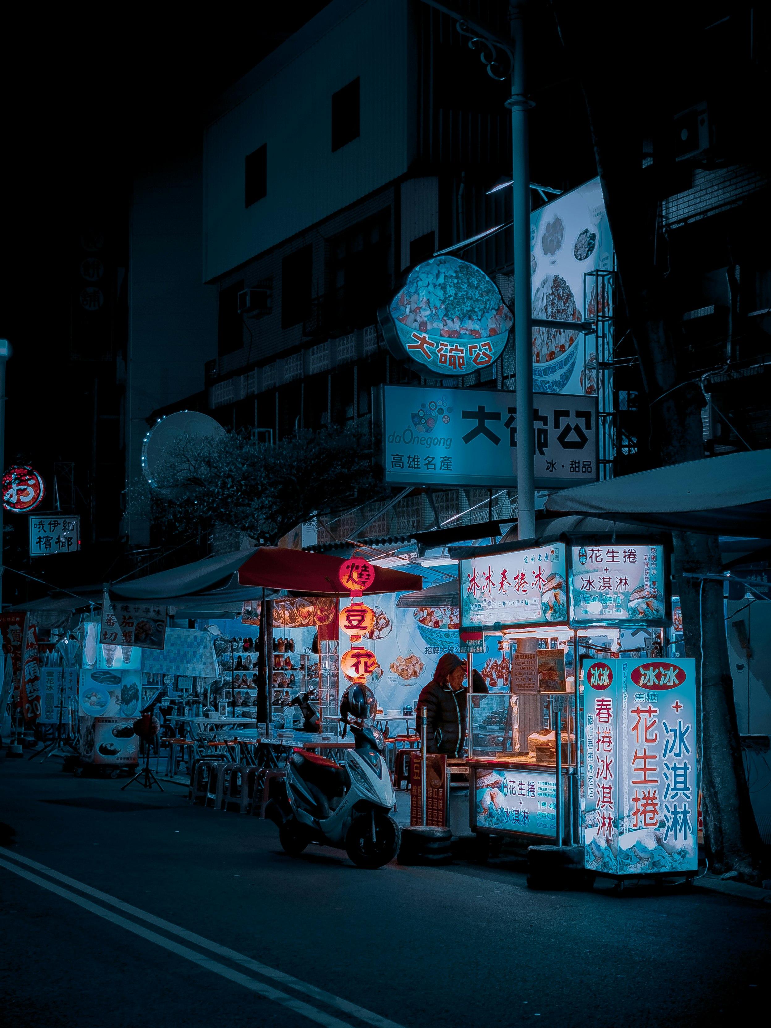 people walking on street during nighttime